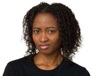 African American woman with look of being upset in her expression