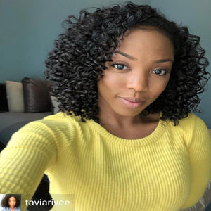 Young woman rocking a well defined twistout using the Moisture LOC Kit 